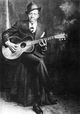 Robert Johnson with guitar