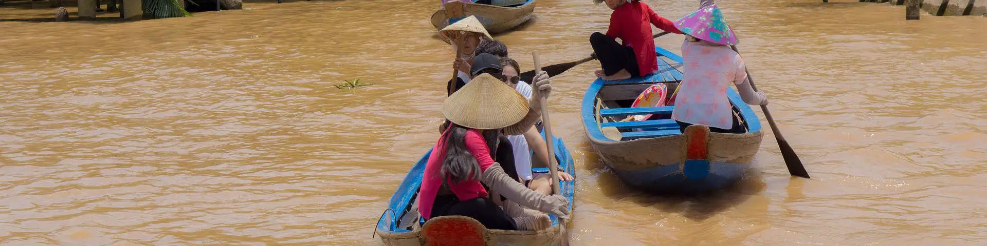 boat people on mekong river