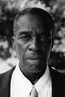 Black and white portrait photo of Skip James