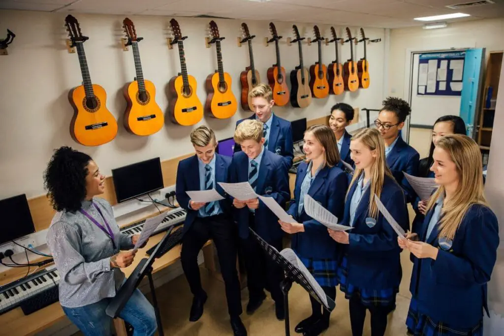 Classroom of students reading music in a music college