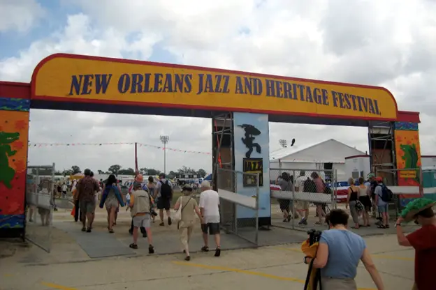 People walking through the entrance to New Orleans Jazz Festival - Flickr Image by Wally Gobetz