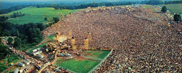 Aerial photo of the crowd at Woodstock '69 - https://www.woodstock.com