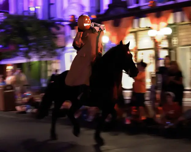 A headless man on a horse riding at Disney World - The Headless Horseman Rides Tonight" by Express Monorail 