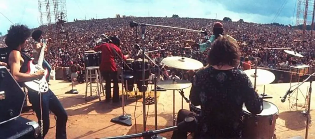 Santana photographed on stage at Woodstock '69 - https://pophistorydig.com/topics/santana-woodstock-1969/