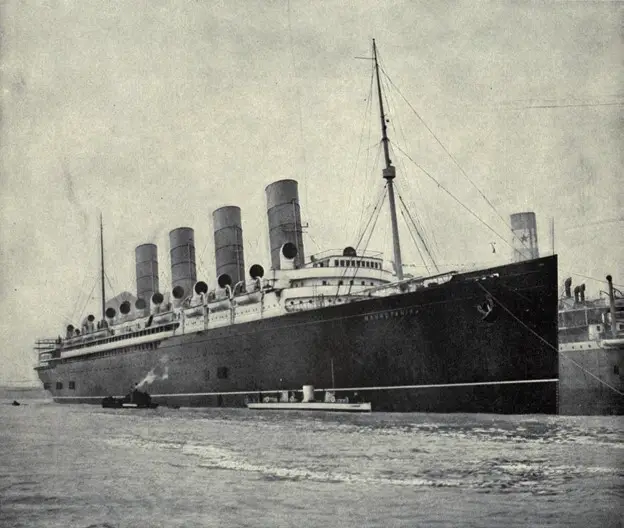 The steamship Mauretania, designed by Leonard Peskett. 1911. Unknown photographer / https://commons.wikimedia.org/wiki/File:EB1911_Ship,_Cunard_Liner,_Mauretania,_with_Turbinia_alongside.jpg 
