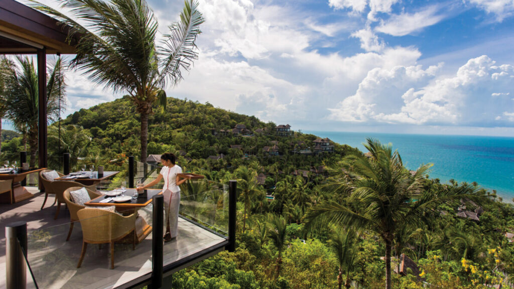 Stunning veranda overlooking tropical land and seascape. Supplied by https://press.fourseasons.com/