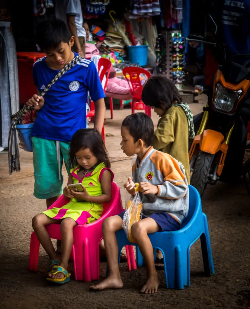 a group of 4 cambodian children at Angkor Wat